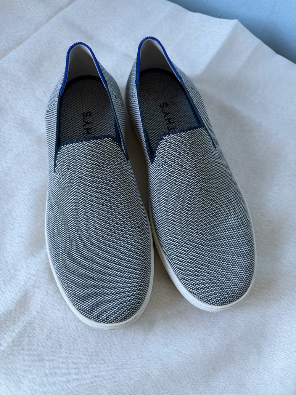 Rothy's Women's Slip-On Knit Sneakers in Gray with Blue Trim
